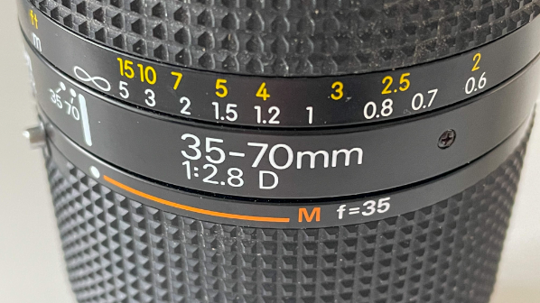 The Nikkor 35-70 is a classic lens in the AF lineup, and it gives distance information